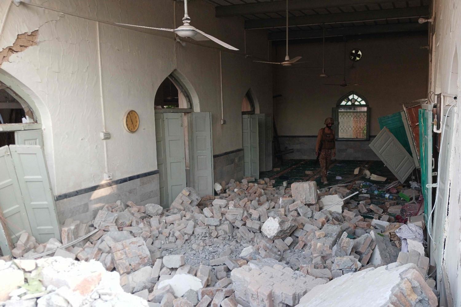 Death toll from attack at police HQ in Pakistan rises to 31