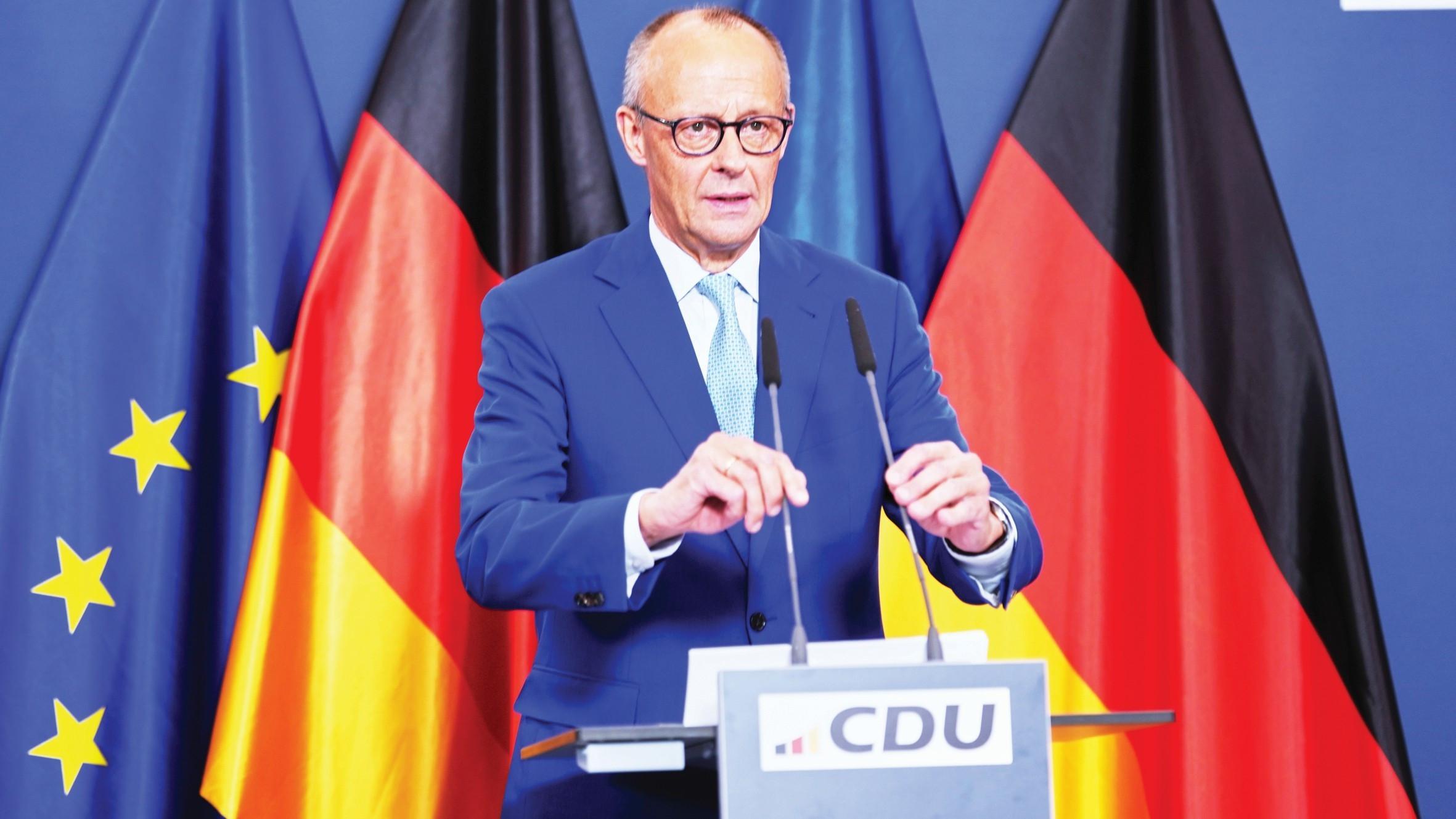 Merz under pressure after bruising state election loss-es