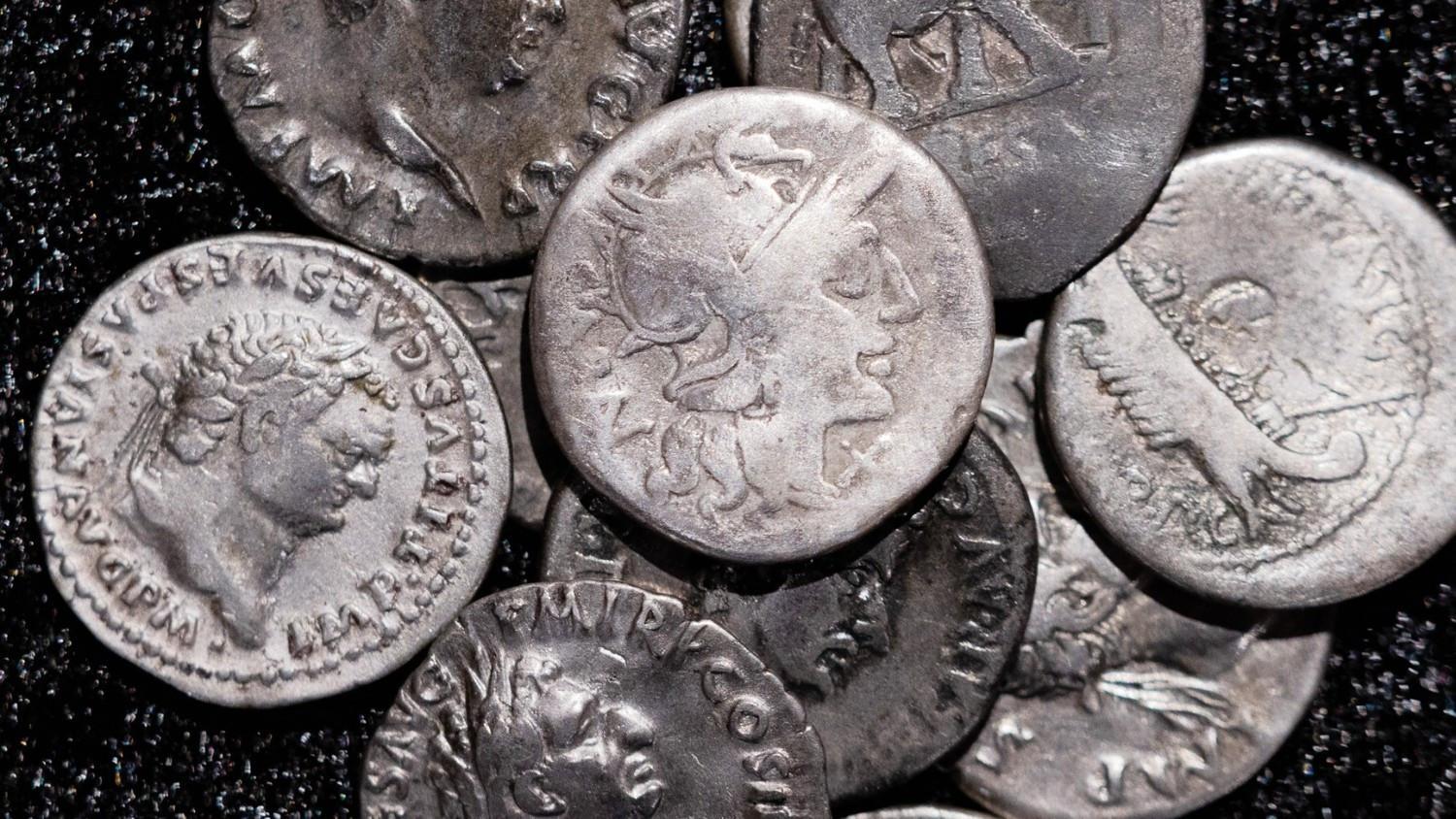 Amateur archaeologist finds Germany’s biggest hoard of Roman coins