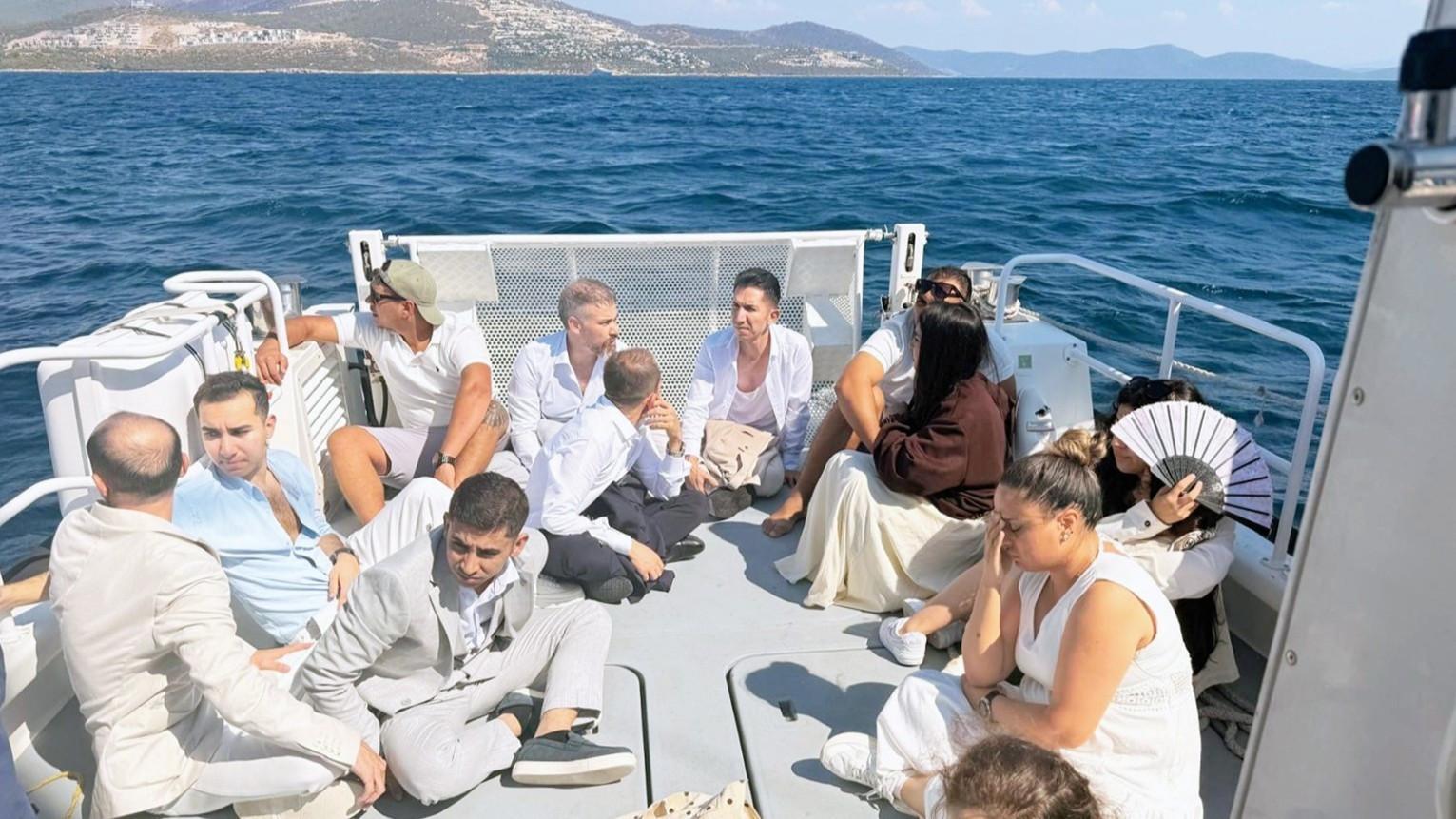 Migrants disguised in suits intercepted off Türkiye’s Muğla