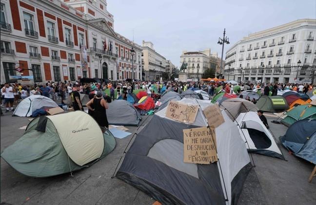 Madrid protest camp grows after eviction outrage