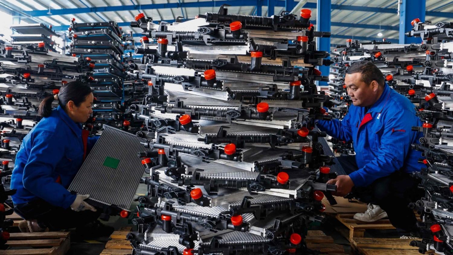 China factory activity returns to growth in September