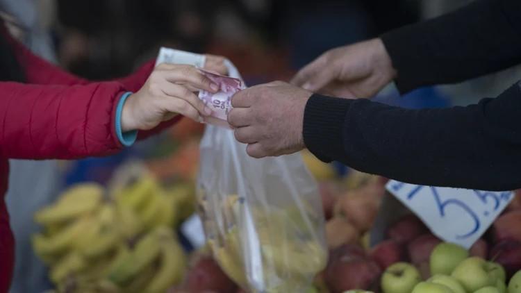 Households turn more optimistic on inflation, survey shows