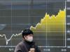 Asian stock markets rise, dollar dips as traders await US jobs