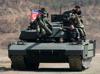 North Korean leader, daughter try out new tank