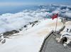 Snowy summit of Tahtalı Mountain attracts visitors in spring