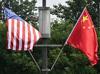 Trump vows to push Xi to open up China at superpower summit