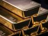Gold jumps, investors keep their eyes on central banks