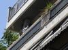 Greek police arrest three after blast kills woman