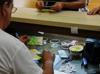 In Isareli-occupied West Bank, too much cash breaks economy