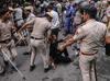 Indian police fire tear gas on exam protesters