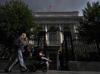 Russian central bank cuts key interest rate despite rising inflation