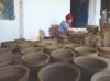 Local women turn volcanic rock into durable cookware