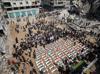 Gazans hold mass funeral for those killed during war
