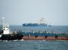 Iran, Oman plan for temporary Hormuz corridor as US impasse persists