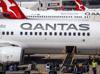 Qantas says profits slump as fuel costs surge