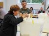 Bosnia votes as wartime ethnic divisions dominate
