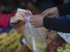 Households turn more optimistic on inflation, survey shows