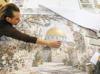 Syrian mosaic artist revives family craft after returning home