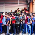 Hundreds of Syrians stampede to get refugee IDs in western Turkey