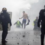 Protest clashes erupt in Paris at anti-Macron rallies