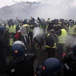 Protest clashes erupt in Paris at anti-Macron rallies