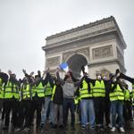 Protest clashes erupt in Paris at anti-Macron rallies