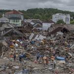 Photos of Indonesia tsunami aftermath show devastation, tragedy