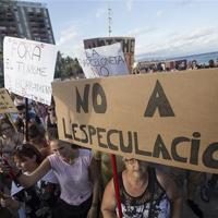 Barcelona residents fight back against drunken, naked tourists