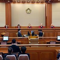 S Korea court reinstates impeached PM Han as acting president