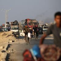 Israel flattens Gaza City high-rise as it tells residents to flee