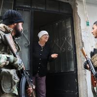 Tensions flare in Syria's Homs after double murder