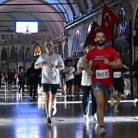 Runners race through Istanbul’s Grand Bazaar on year’s longest night