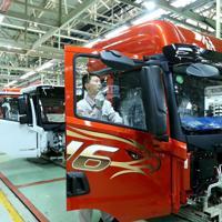 China's factory activity edges up, snapping 8-month slide