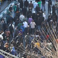 Member of Iranian security forces killed during protests