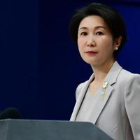 China says will 'safeguard' interests after Trump tariff threat over Iran