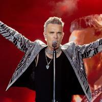 Robbie Williams tops Beatles with record UK number one albums