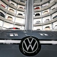 Struggling German auto giant Volkswagen's profits plunge