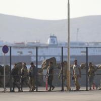 Greece reconsiders thousands of asylum cases