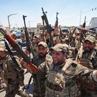 Iraq sets September deadline for integration of armed groups
