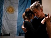 Tango enthusiasts sway the blues away