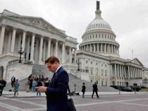 US government hours from shutdown, funding chaos