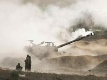 Israeli troops launch brief ground raid into Gaza ahead of expected wider incursion