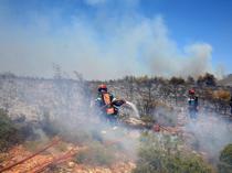 Firefighters calm deadly Athens inferno