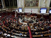 French parliament adopts law to keep gov’t functioning until new budget
