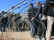 Israel withdraws but keeps five positions in south Lebanon