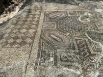 Mosaic with Star of David and Greek inscription found in grave