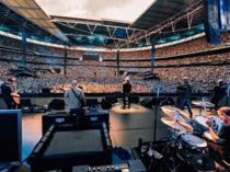 Man dies after falling at Oasis gig in London
