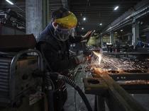 Industrial production surges 8.3 pct in June