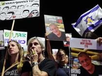 Israel says received remains of 3 Gaza hostages as fragile ceasefire holds